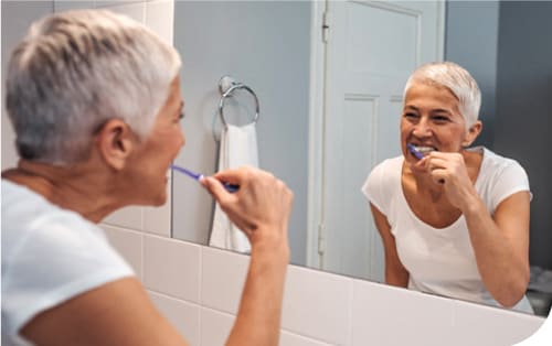 Hvordan virker højfluorid tandpasta?