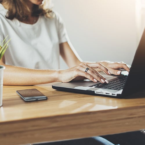 Professional business woman working on her computer